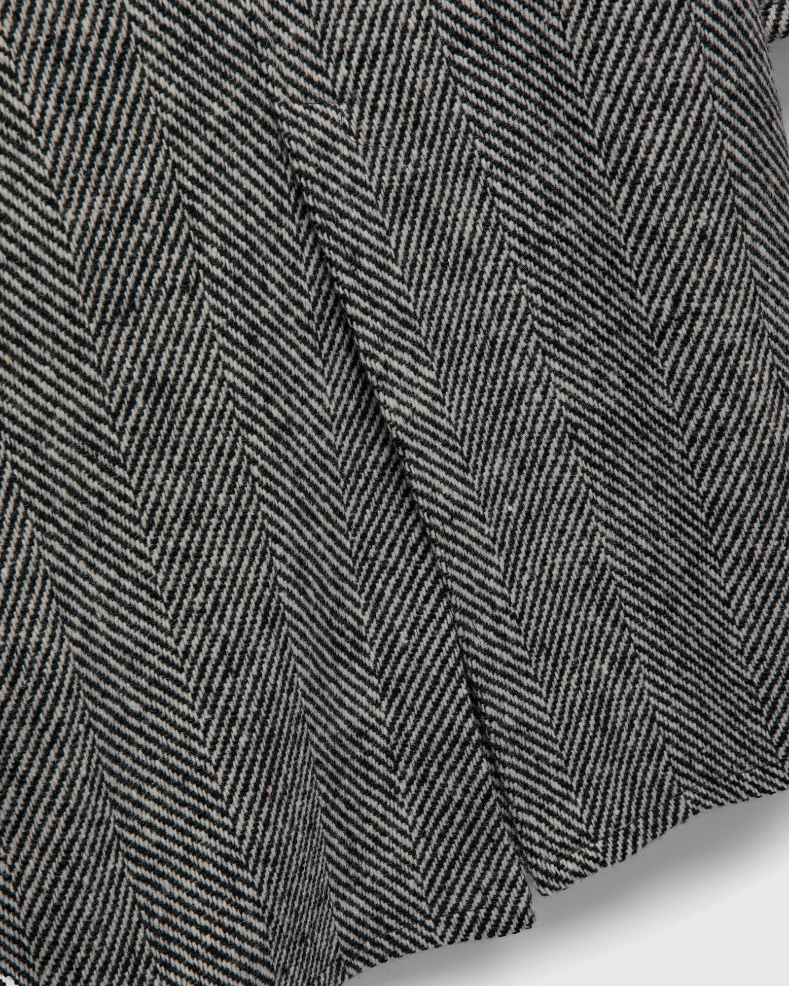Raglan Wool Overcoat in Black/Cream Herringbone Tweed - Image 11