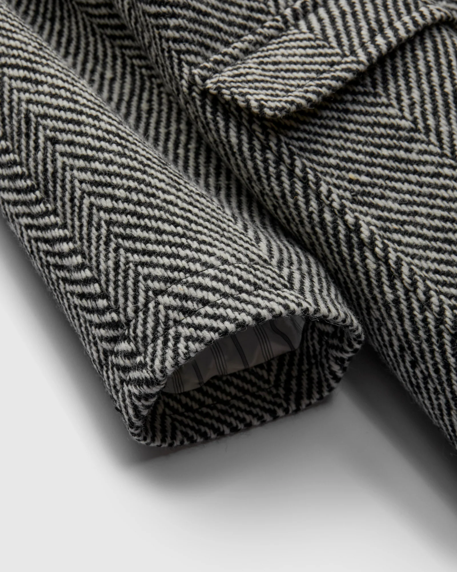 Raglan Wool Overcoat in Black/Cream Herringbone Tweed - Image 6